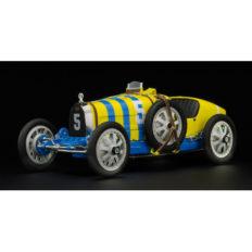 vieille voiture de course jaune et bleu