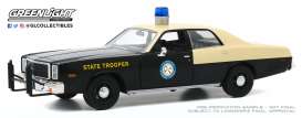 vieille voiture de police noire et beige