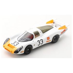 vieille voiture de course blanche et orange