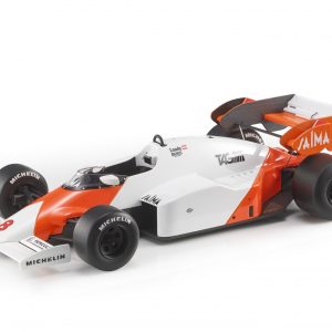 vieille voiture de course orange et blanche formule 1