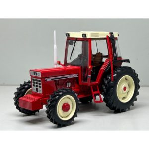 vieux tracteur agricole rouge et beige