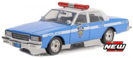 vieille voiture de police bleu et blanche