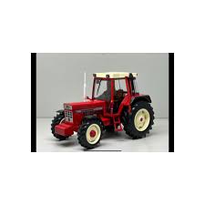 vieux tracteur agricole rouge et blanc