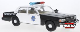 vieille voiture de police blanche et noire