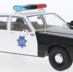 vieille voiture de police blanche et noire