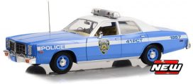 vieille voiture de police bleu et blanche