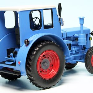 vieux tracteur agricole bleu