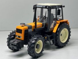 vieux tracteur agricole orange et blanc