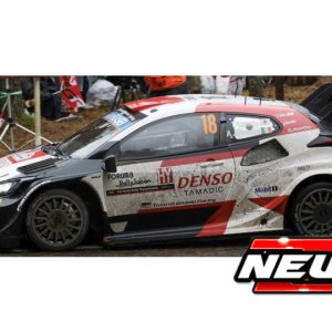 petite voiture de course rallye blanche et rouge