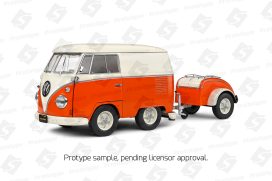 vieux minibus orange et blanc avec remorque