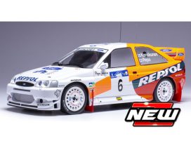 vieille voiture de rallye orange blanche et rouge