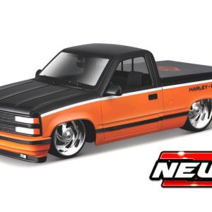 vieux pick up orange et noire