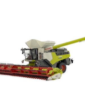 grosse machine agricole moissonneuse verte et orange