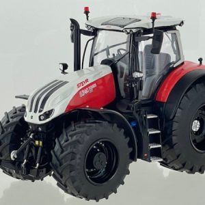 gros tracteur agricole rouge et blanc