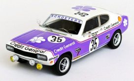 vieille voiture de course mauve et blanche