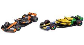 voiture de course formule 1 oange et noir et jaune et verte