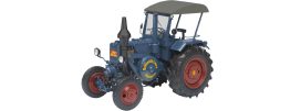 vieux tracteur agricole bleu