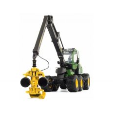 machine forestiere verte et jaune