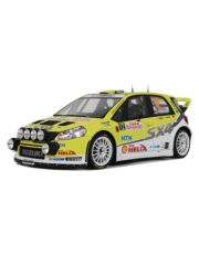 voiture de rallye jaune et blanche