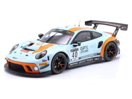 voiture de course allemande orange et bleu