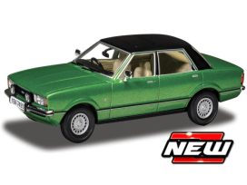 vieille voiture berline verte avec toit noir