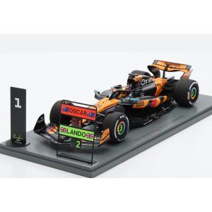 voiture de course orange formule 1