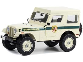vieille jeep de police beige et verte americaine