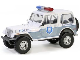 vieille jeep de police americaine blanche et grise