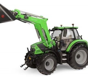 gros tracteur agricole vert avec pelle avant noire