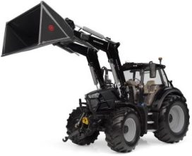 gros tracteur agricole noire avec pelle avant