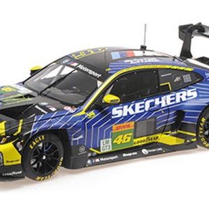 voiture allemande de course bleu et jaune