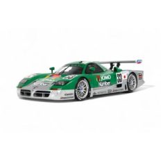 vieille voiture de course grise et verte