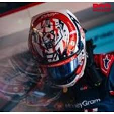 casque de pilote de formule 1 rouge et blanc