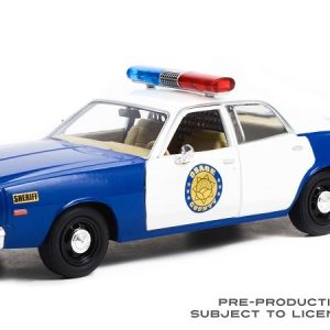 vieille voiture de police bleu et blanche