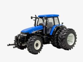 vieux tracteur agricole bleu avec double roue arriere